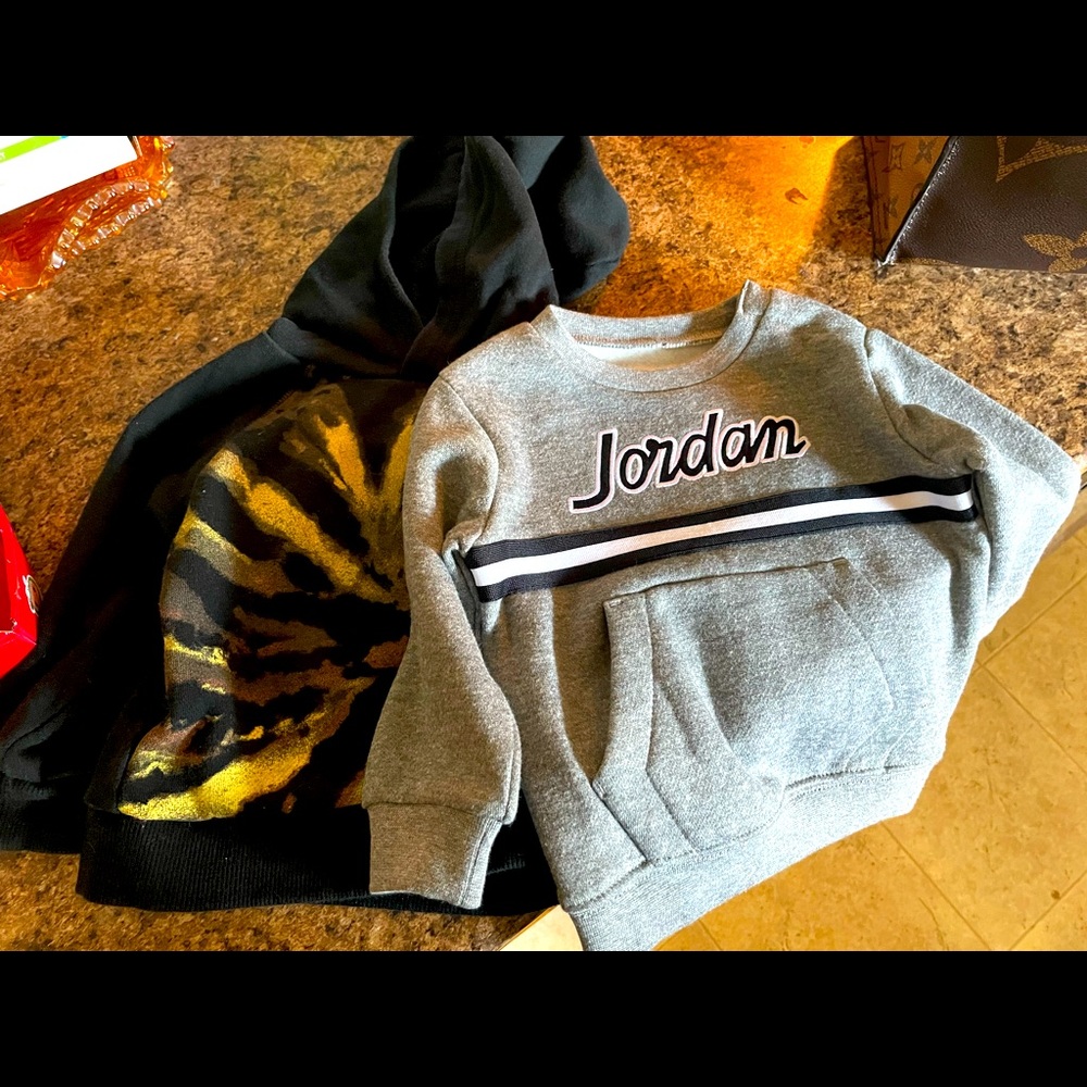 Two 12 month sweatshirts worn once